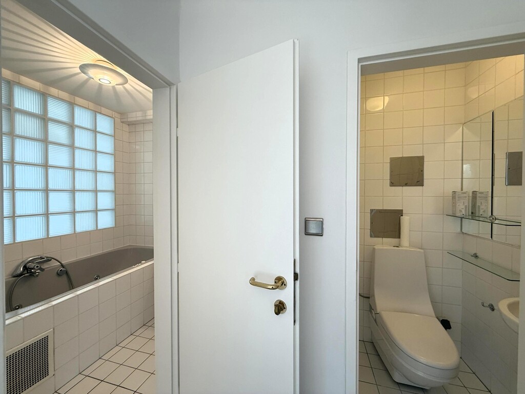 Bad mit Jacuzzi/Toilette