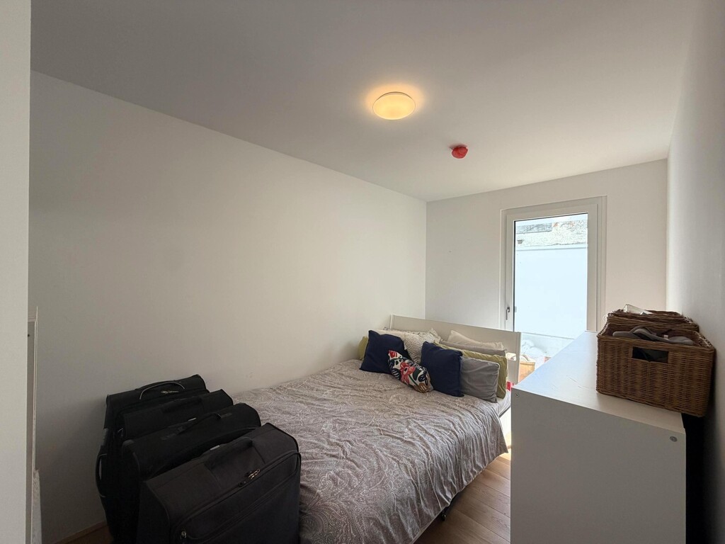 Schlafzimmer 1/2 mit Ausgang in den Garten