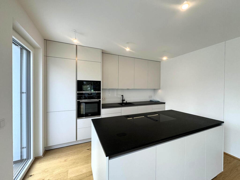 Wohn-/Esszimmer mit Küche von Steininger u Miele-G