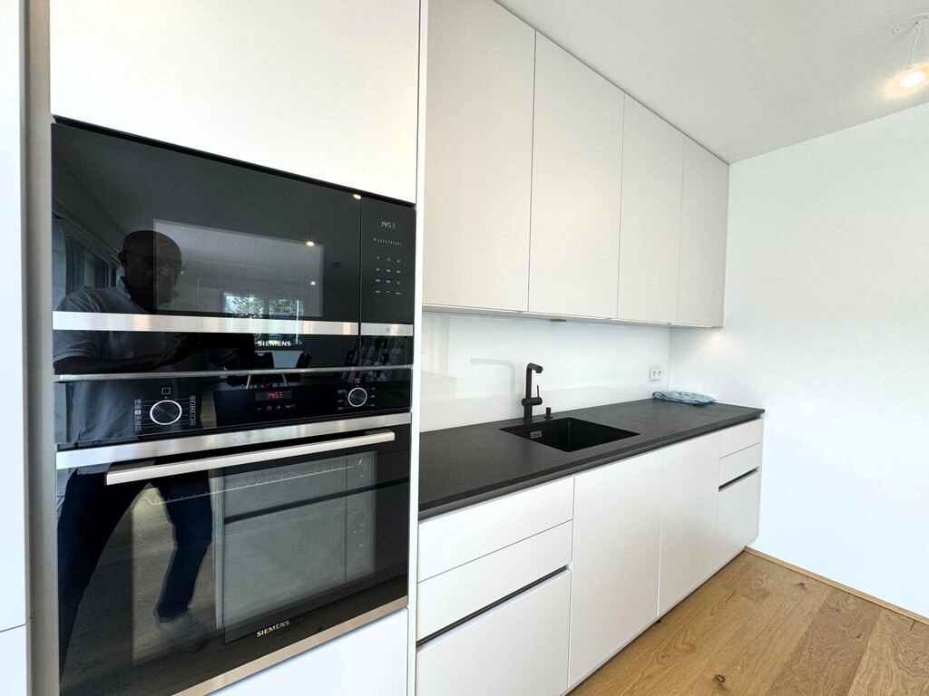 Wohn-/Esszimmer mit Küche von Steininger u Miele-G