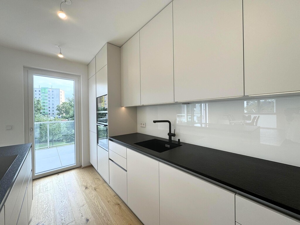 Wohn-/Esszimmer mit Küche von Steininger u Miele-G