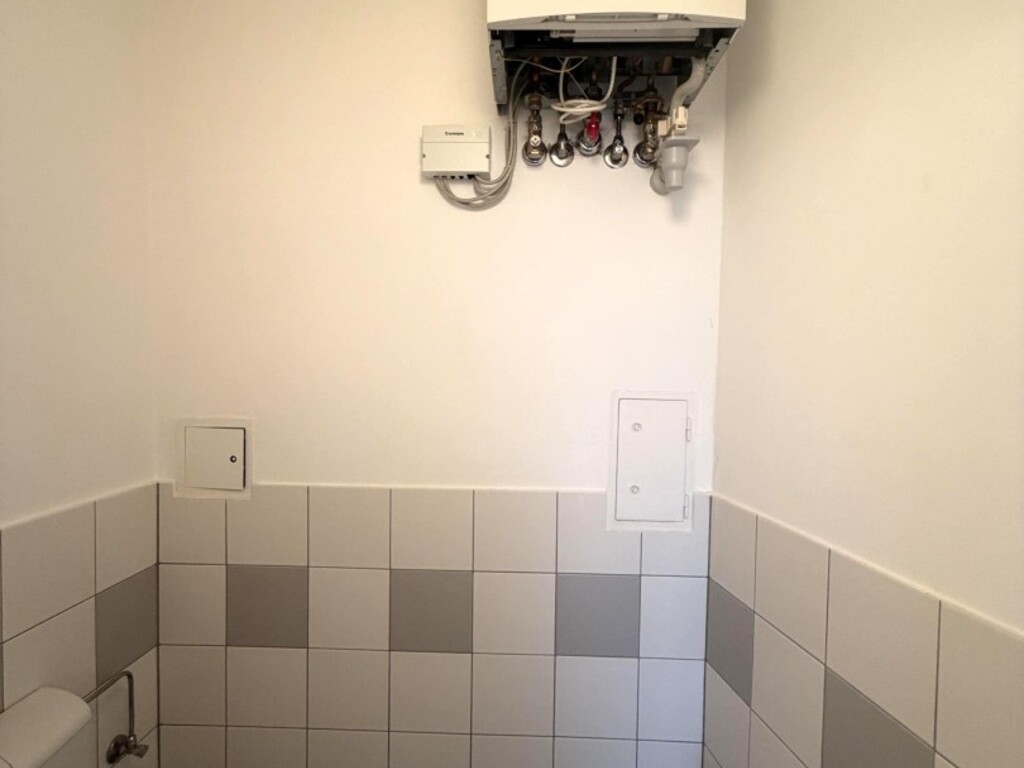 Toilette mit Gasetagenheizung