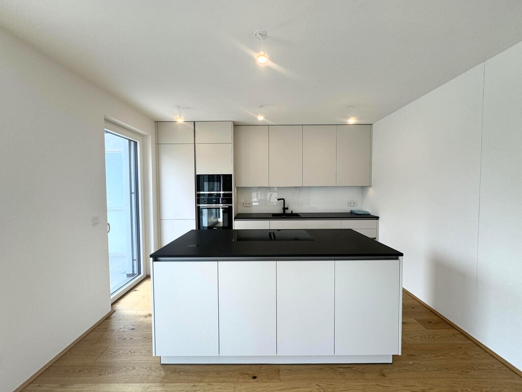 Wohn-/Esszimmer mit Küche von Steininger u Miele-G